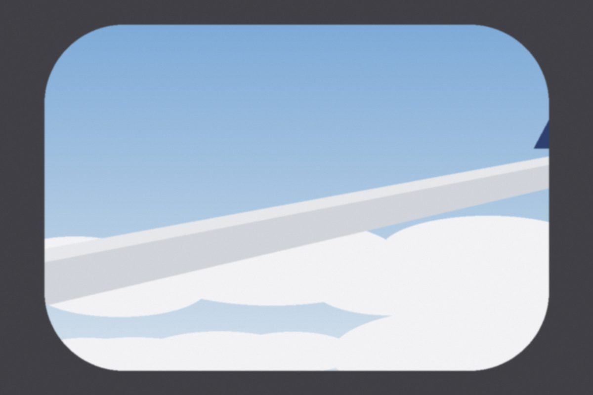 View of the wing over clouds from the window